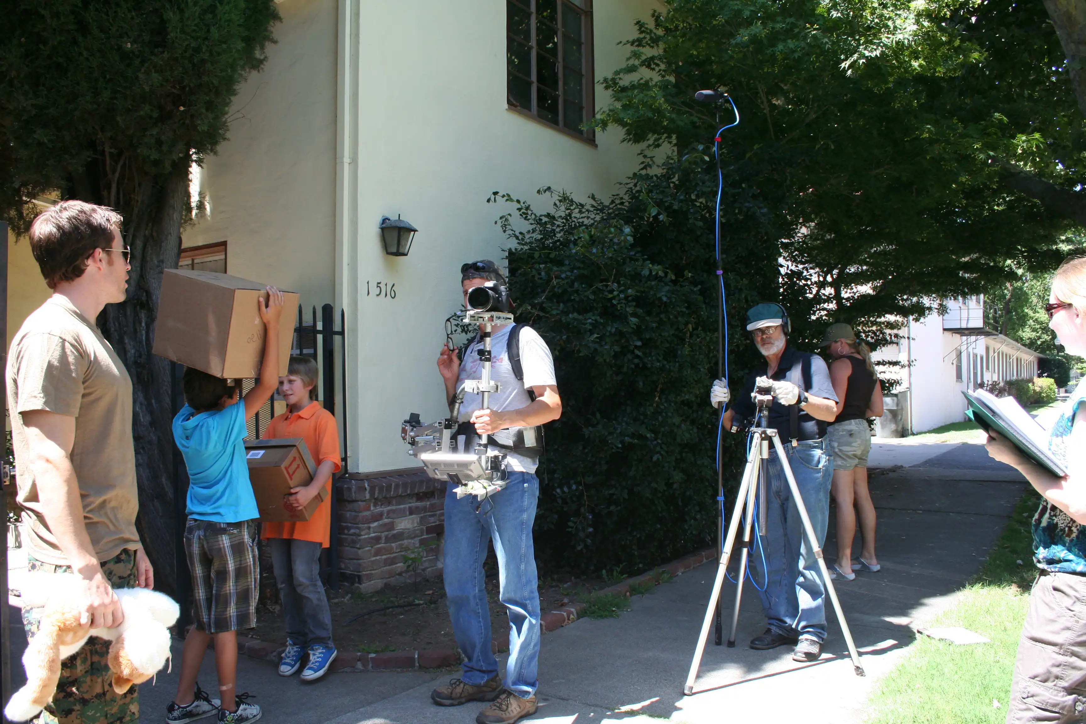 Richard Ryan, Aramis Liam, Bryton Berdahl, Brendan Brooks on Camera, Scott Slotterbeck on Boom, and Krystina Mae the script-superviser in a courtyard for an apartment complex for BUDDIES July 23, 2011.