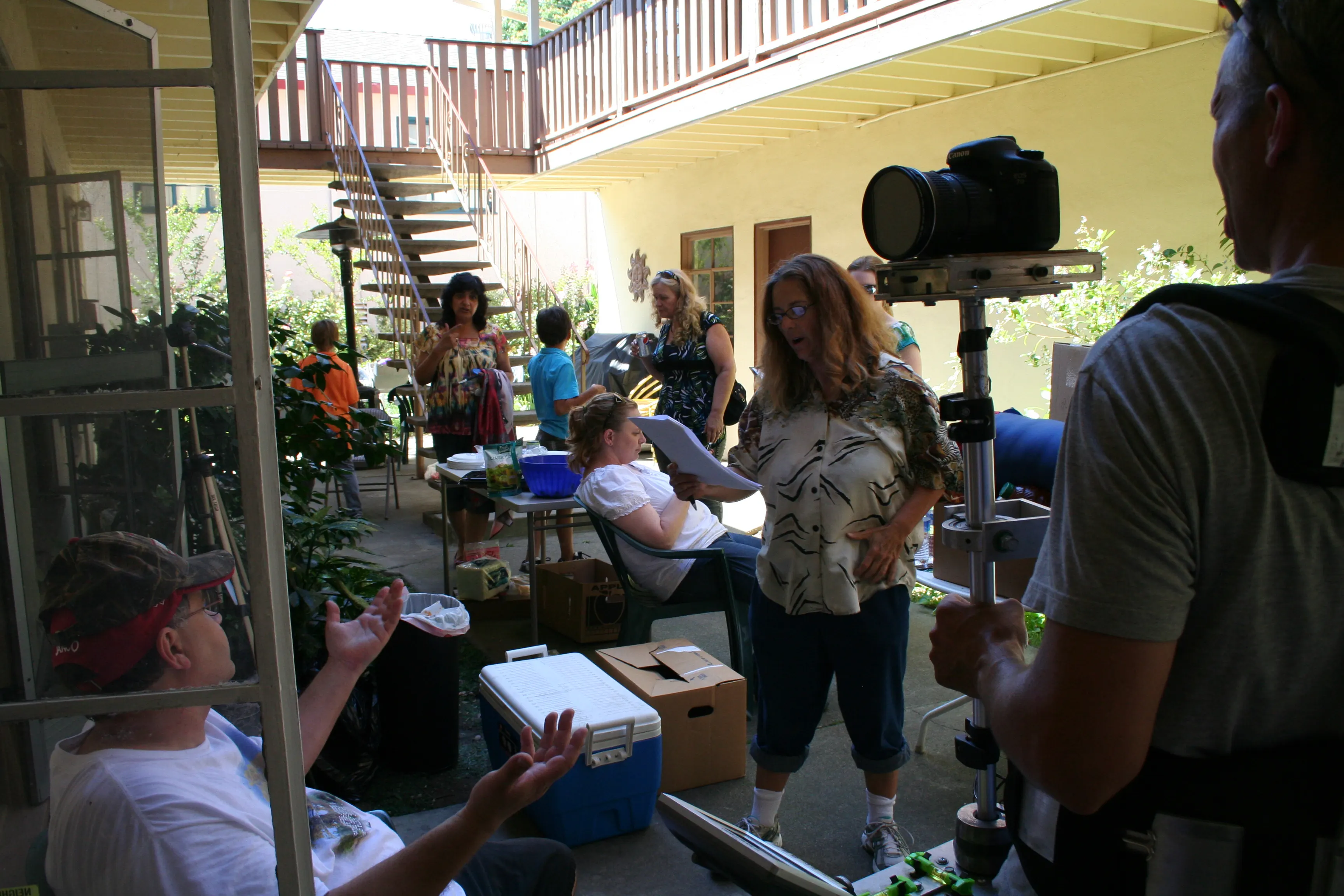 Cast and Crew resting #1 in a courtyard for an apartment complex for BUDDIES July 23, 2011.