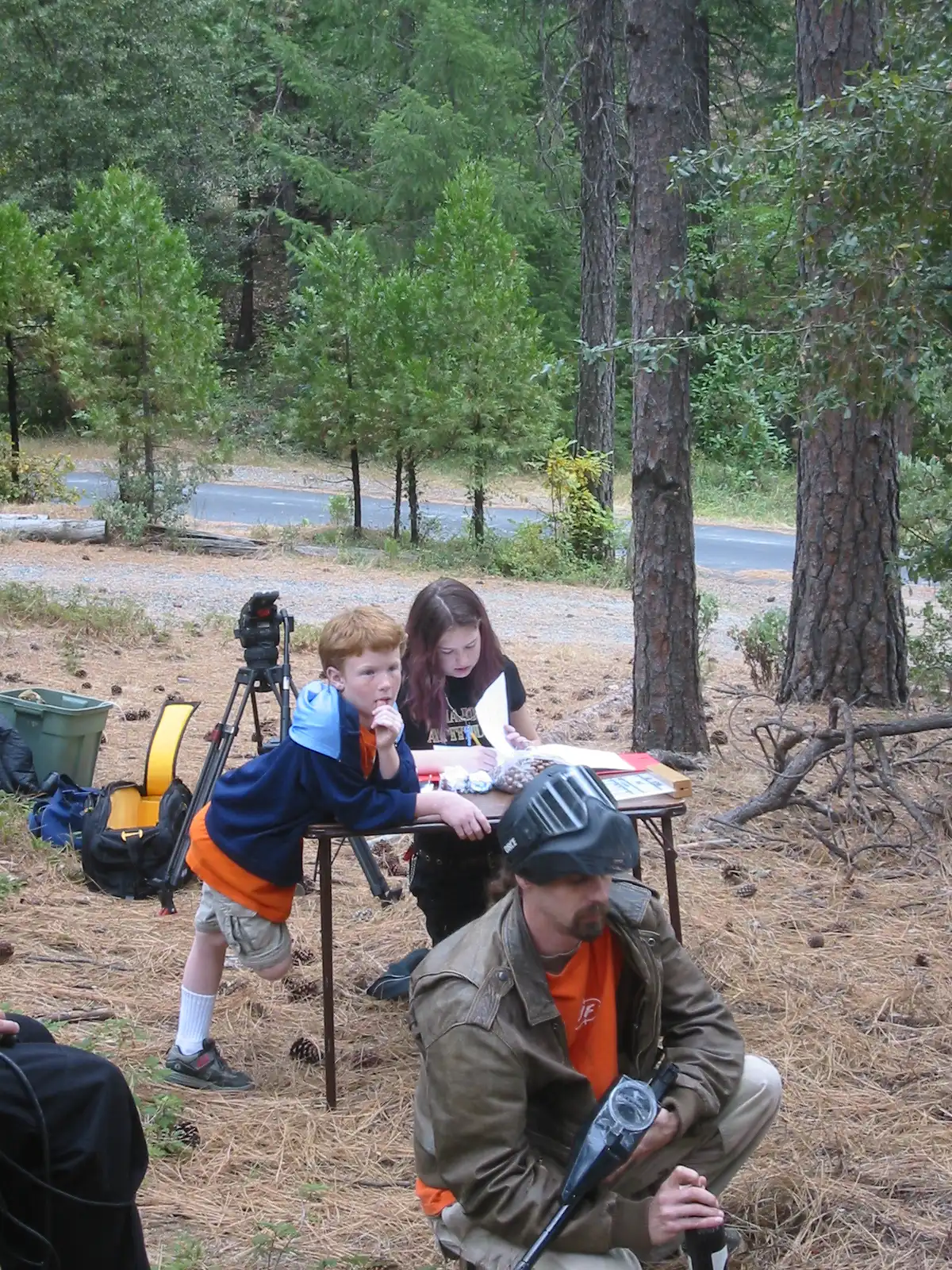 Mathew Young, Kyriè Sierra Davenport, and Justin Mosier off camera watching day 1 of Paint (2006) production on October 19, 2005.