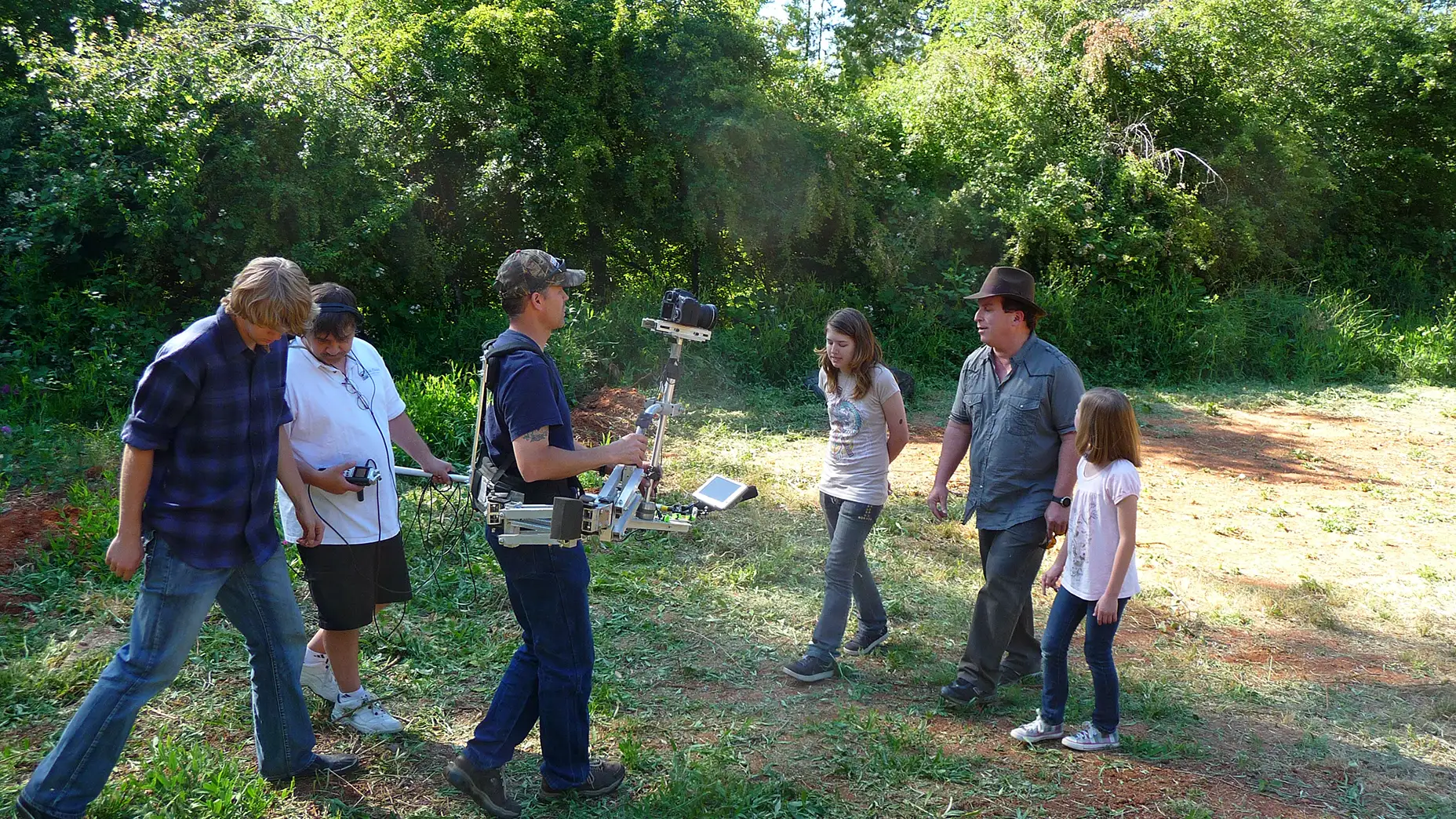 Aria Leven Davenport, Gerald on the boom, and Brendan Brooks capturing Kyriè Sierra Davenport, Gary Udell, and Karly Avva in a scene that was never used.