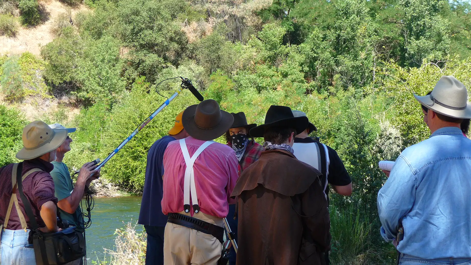 Jim Heck holding Boom and the eyes of Carey White Jr. - on the set of THE GOLdEN TREE at Lotus, California.