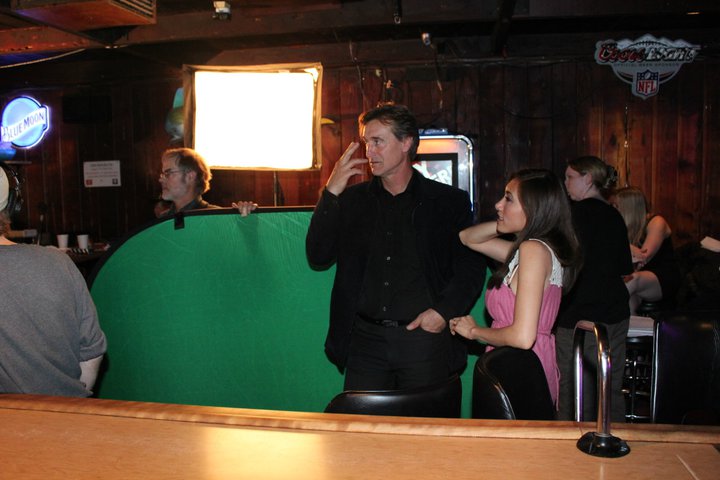 Scott Slotterbeck with green screen. William Van Noland and Yinique Myo-Flores arrive - on the set of the WATERING hole Night 1 at the Cedar Room in Carmichael, California.