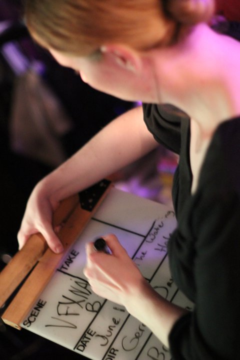 Krystina Mae: second assistant camera prepares the slate for the VFXNAB scene - on the set of the WATERING hole Night 1 at the Cedar Room in Carmichael, California.