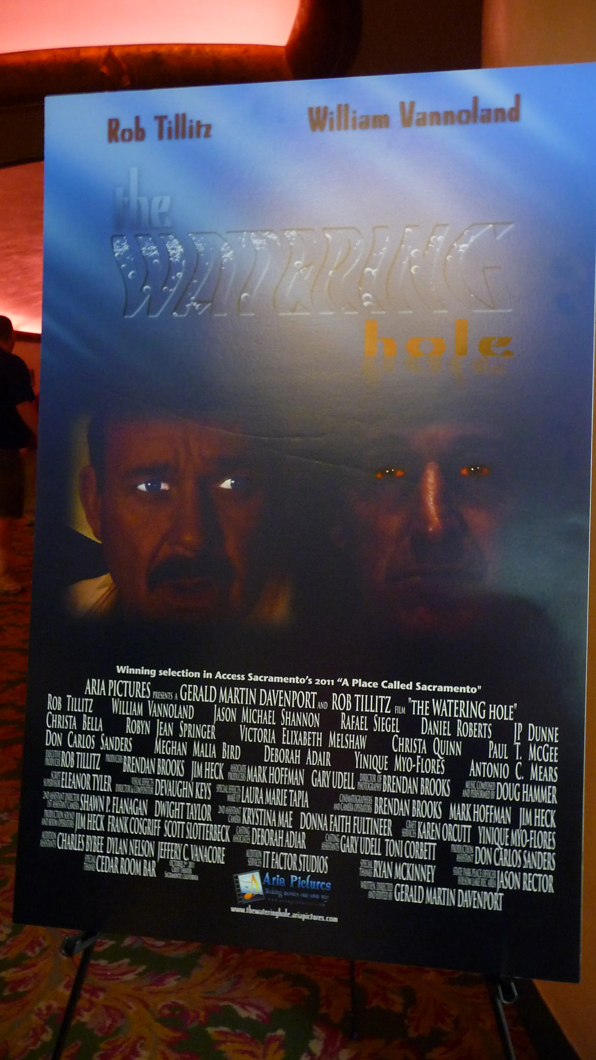 the WATERING hole (2011) poster in the lobby of the Crest Theater in Downtown Sacramento.