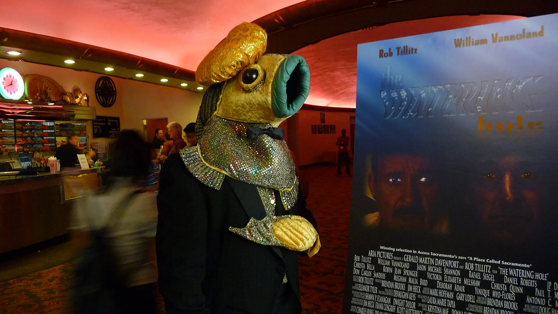 Quentin the Fish with the WATERING hole (2011) poster in the lobby of the Crest Theater in Downtown Sacramento.